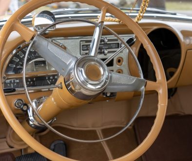Closeup shot of the old column gears steering wheel and car interior